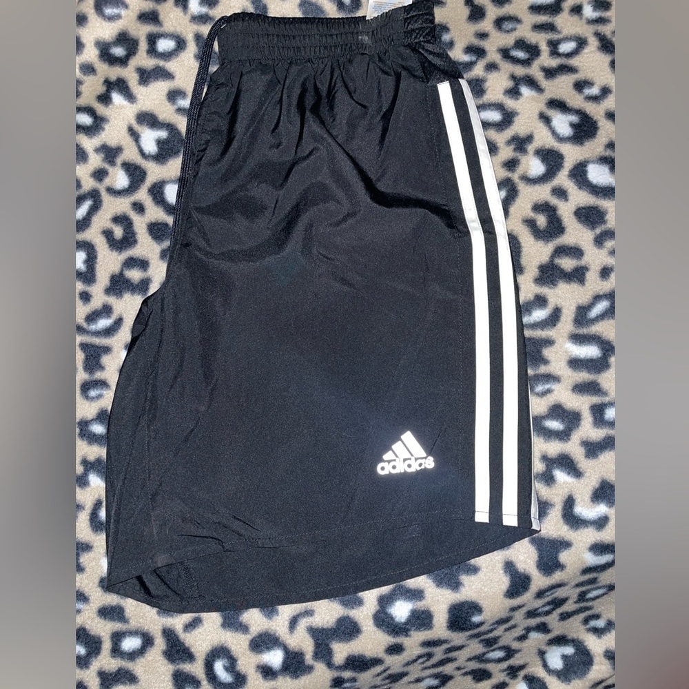 Adidas’s shorts. Pocket w zipper on back. Never worn.